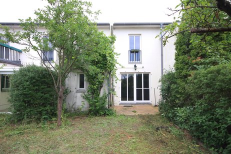 Attraktives Reihenmittelhaus mit Garage und Kamin auf sonnigem Südwest-Grundstück