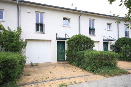Attraktives Reihenmittelhaus mit Garage und Wintergarten auf sonnigem Südwest-Grundstück