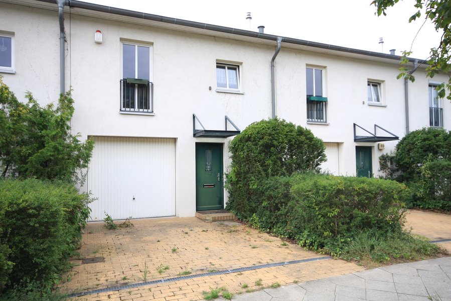 Attraktives Reihenmittelhaus mit Garage und Wintergarten auf sonnigem Südwest-Grundstück