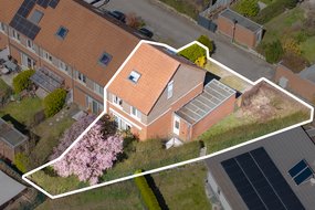 Attraktives, vermietetes Reihenendhaus mit Garage und sonnigem Südgarten