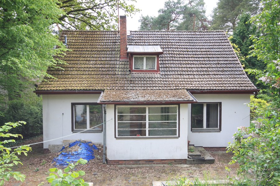Charmantes Einfamilienhaus von 1936 auf parkähnlichen Terrassengrundstück