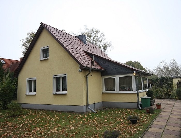 Interessantes Einfamilienhaus mit Werkstatt und Garage auf parkähnlichem Gartengrundstück