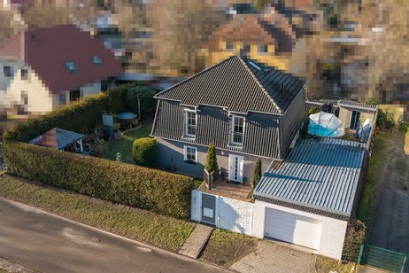 Sehr gepflegtes Mansarddachhaus mit Garage und hochwertiger Ausstattung in ruhiger Wohnlage